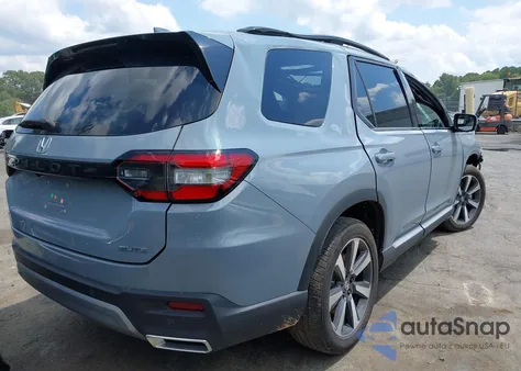 2023 Honda Pilot Awd Elite z USA, uszkodzony, nr VIN 5FNYG1H87PB010180